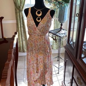 Pink and white floral print dress with belt.